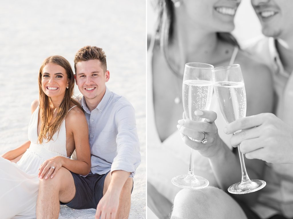 A couple smiling with champagne on the beach during their Lido Key engagement session. 