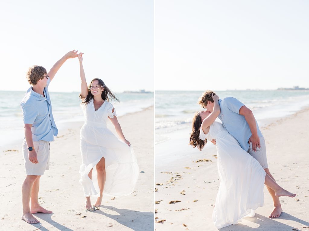 Man and woman dancing on the beach during their engagement pictures on Treasure Island beach in St. Pete Florida.