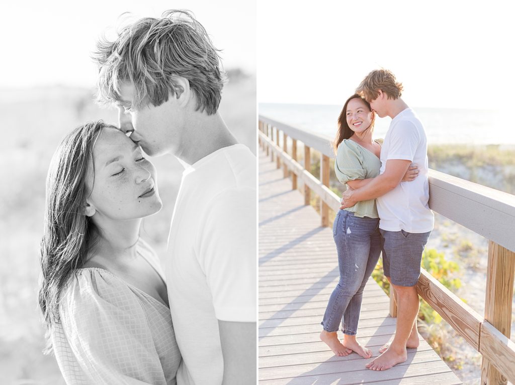 Man kissing woman during their engagement session on the beach. 