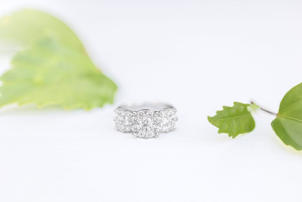 Up close picture of an engagement ring captured by Deanna Grace Photography. 