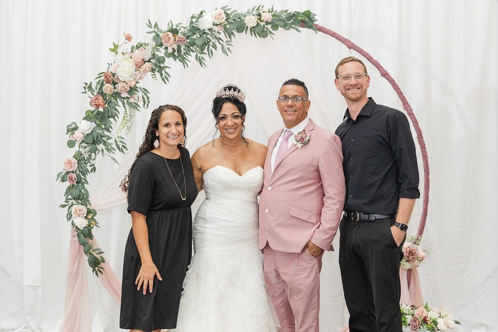 The bride and groom with the husband and wife photography team from Sarasota, Florida. Deanna Grace Photography. 