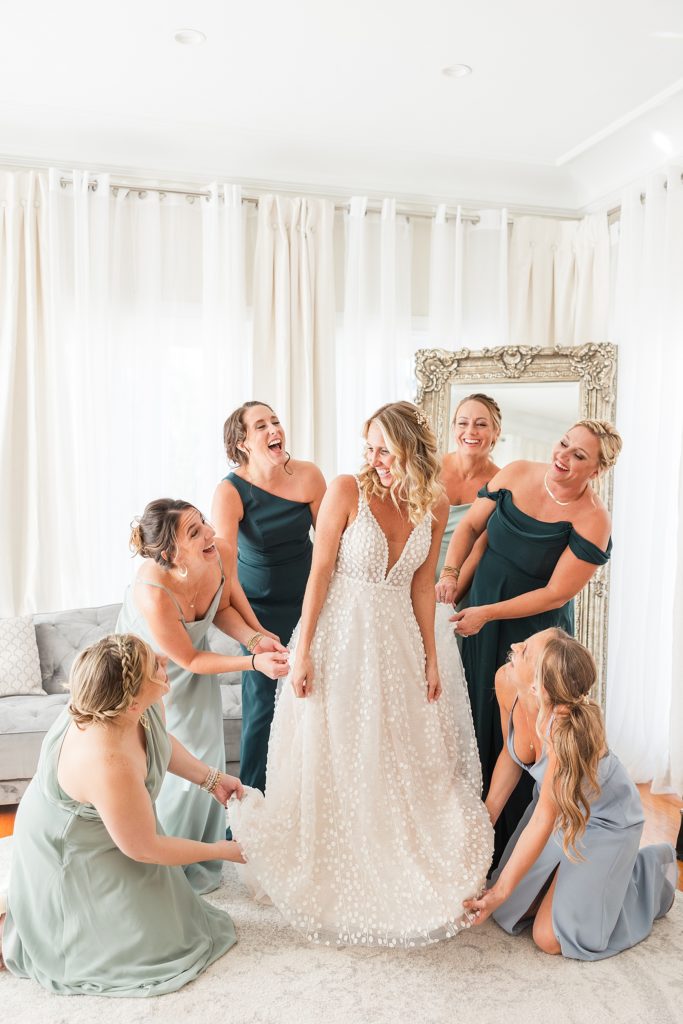 The bride and bridesmaids getting ready at the alderman house by mizner.