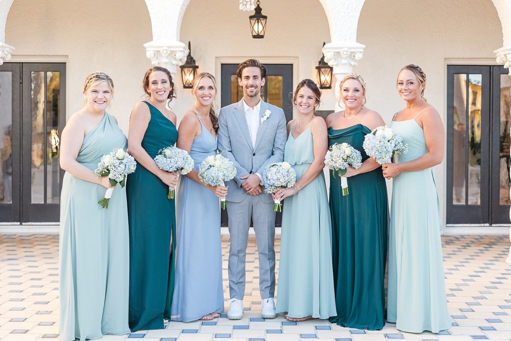 The groom with the bridesmaids. 