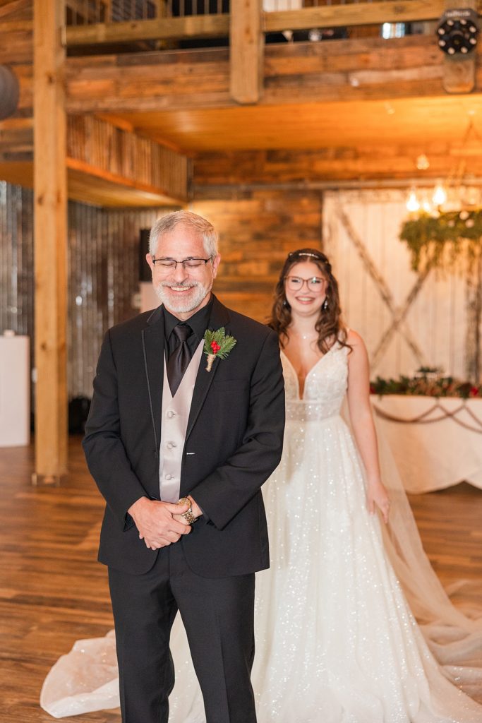 bride first look with dad at the naples wedding barn.