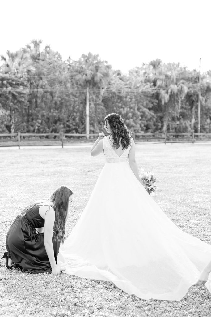 bride getting ready at the naples wedding barn