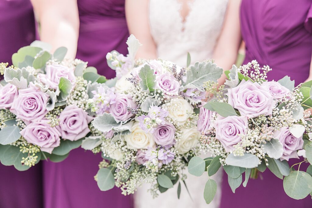 purple and white wedding bouquet. 
