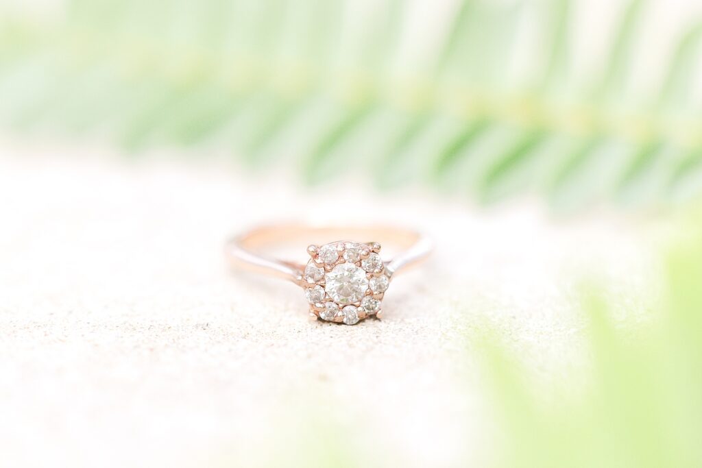 A round rose gold engagement ring. 
