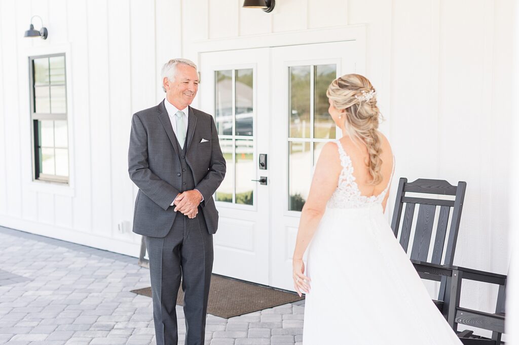 Bride sharing a first look with her dad. 