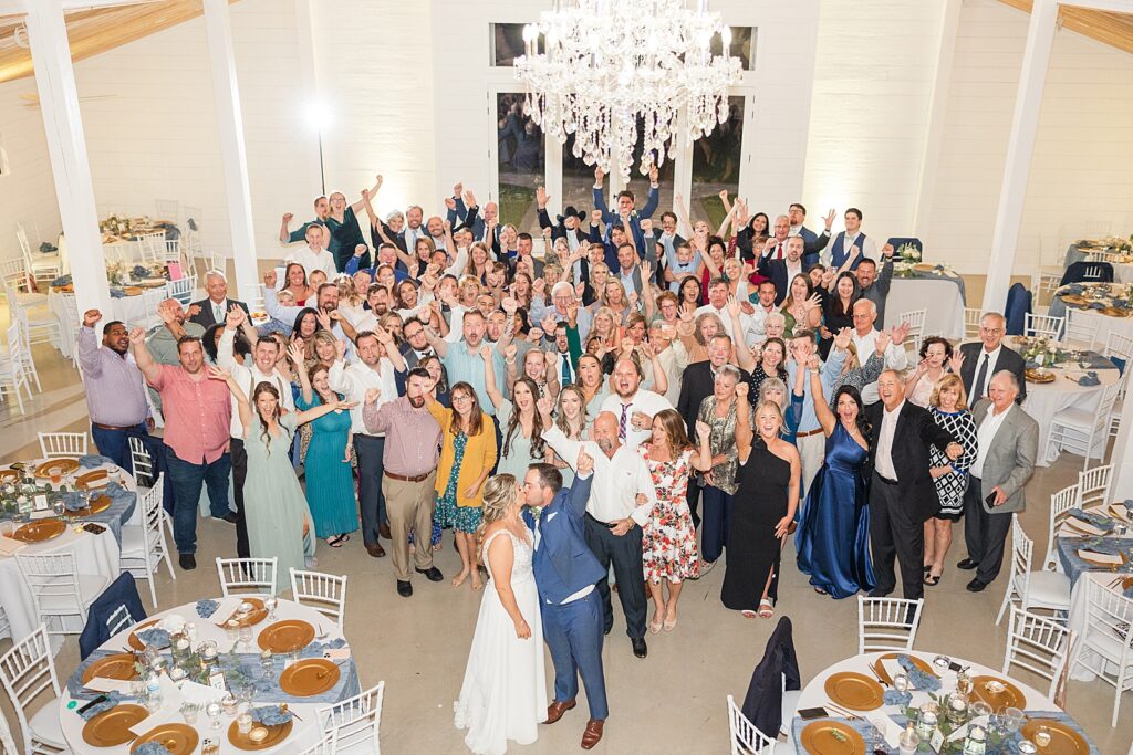 A large group picture of all the wedding guests. 