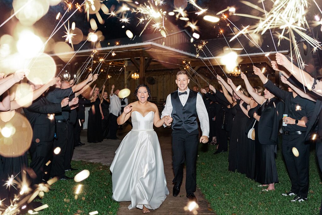 Wedding reception sparkler exit at Wandering Oaks in Myakka City, Florida. 