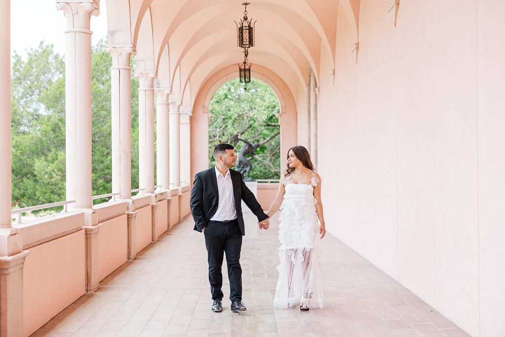 Engagement Pictures at the Ringling down the pink hallway.