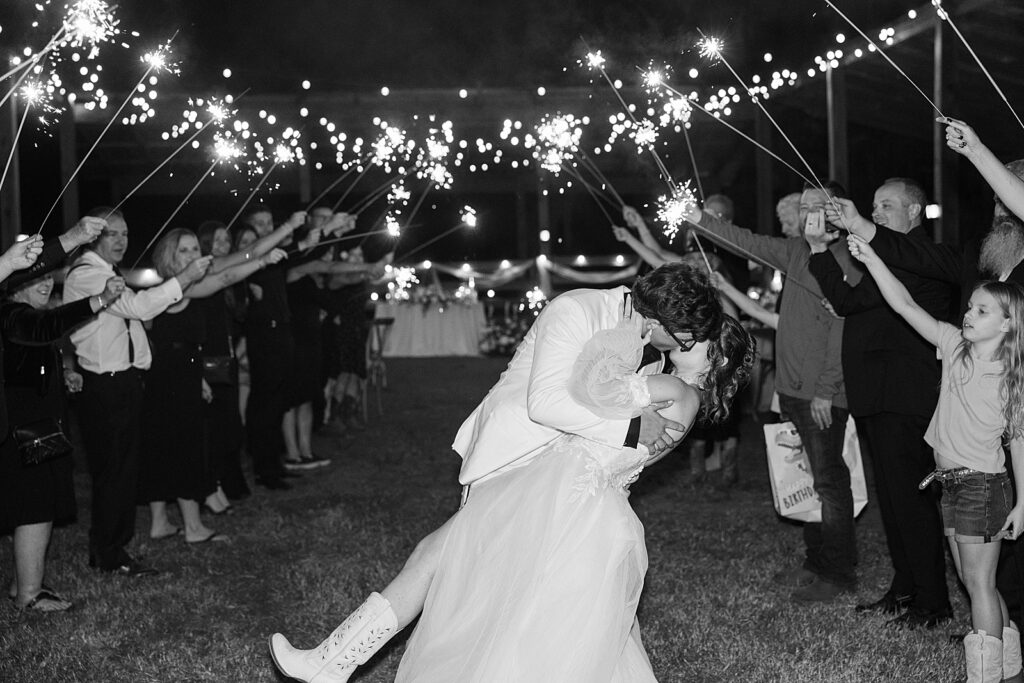 Black and white photo of a sparkler exit. 