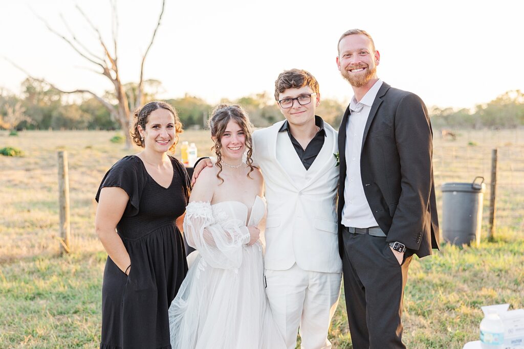 Bride and groom smiling with their sarasota photographers. 