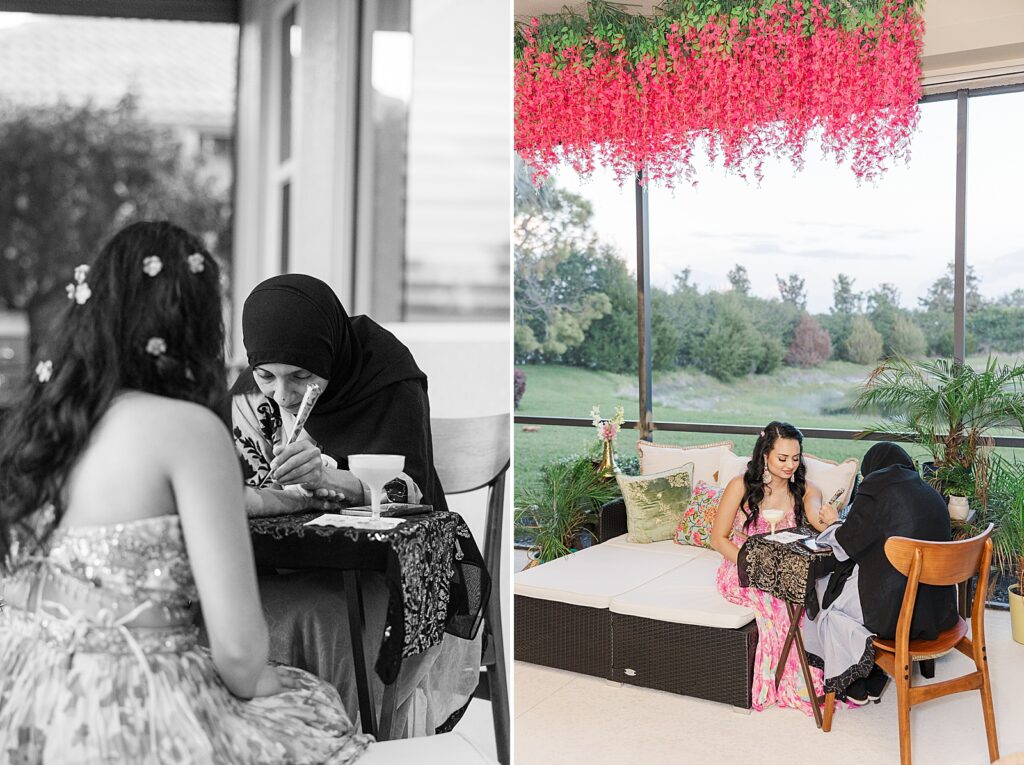 Bride getting henna on her arm and hand.