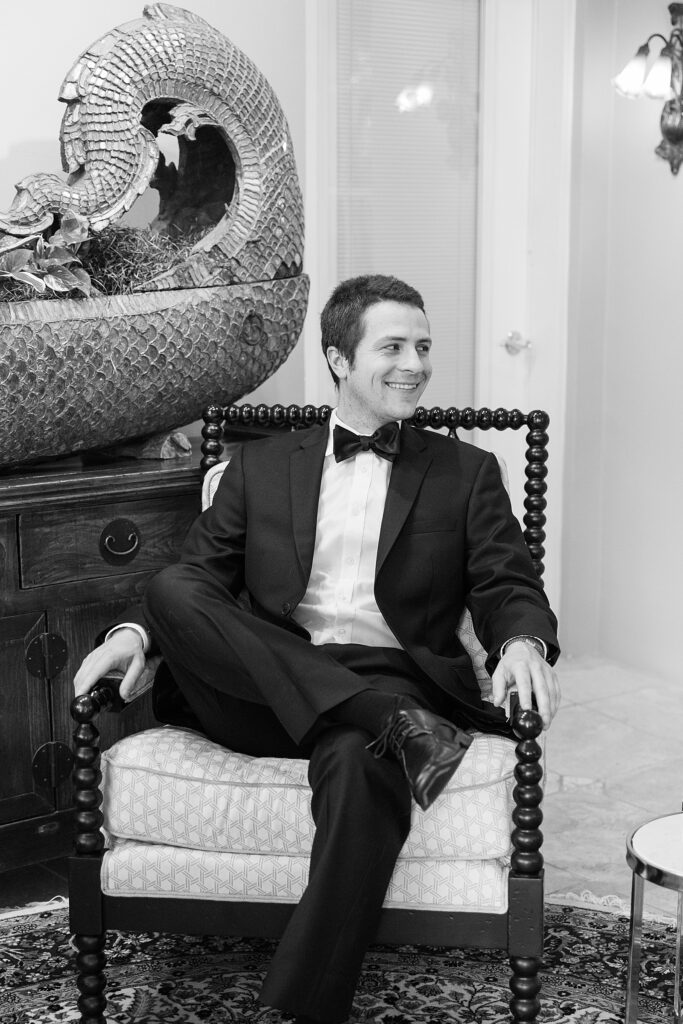 Groom smiling.