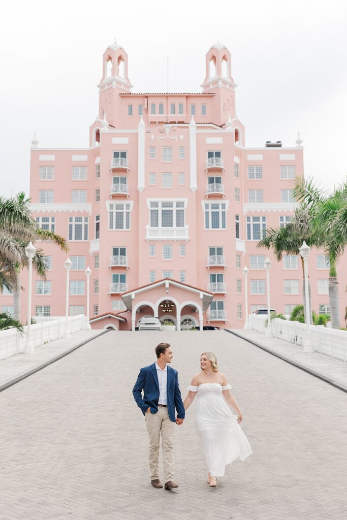 Couple walking outside the Don Cesar Hotel.
