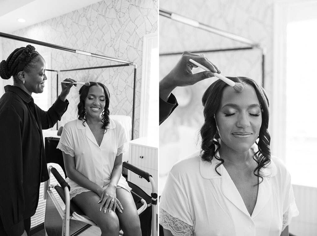 black and white picture of the bride getting makeup on